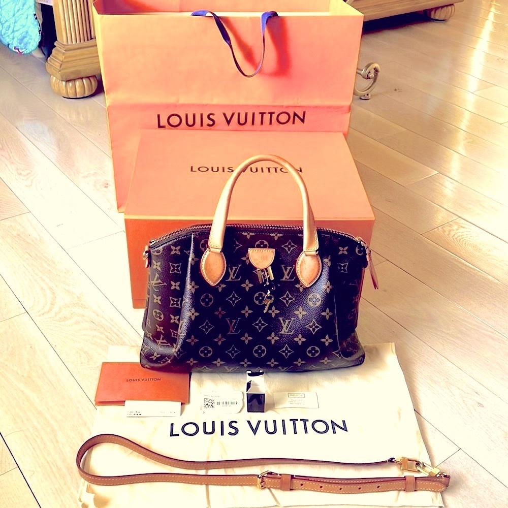 LOUIS VUITTON Monogram RIVOLI MM - Picture 4 of 14